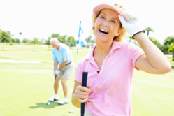 older couple playing golf